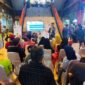 Pemimpin Cabang BRI KC Tanjung Duren Tri Ichsan Nur sedang menyampaikan Sosialisasi kepada padagang Pasar Tomang Barat atau Pasar Kopro